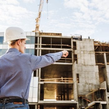 man on site providing construction consulting services