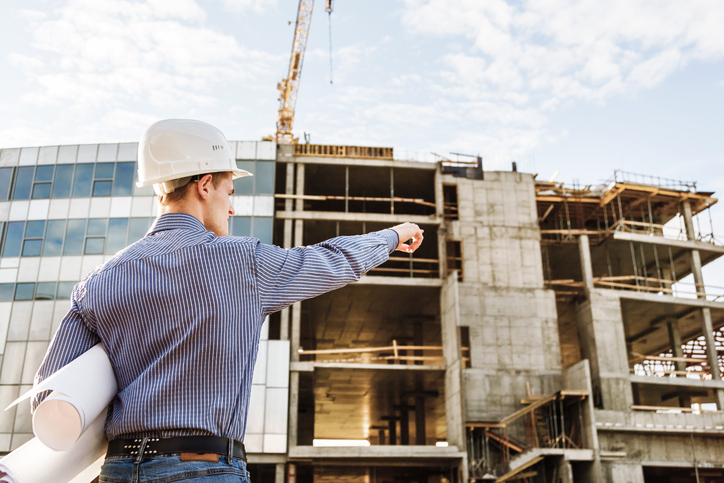 man on site providing construction consulting services