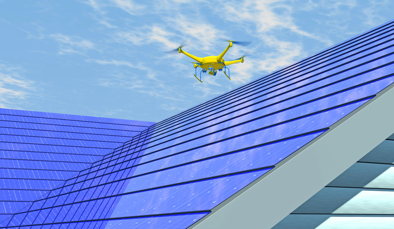 drones doing roof assessments on a blue futuristic roof
